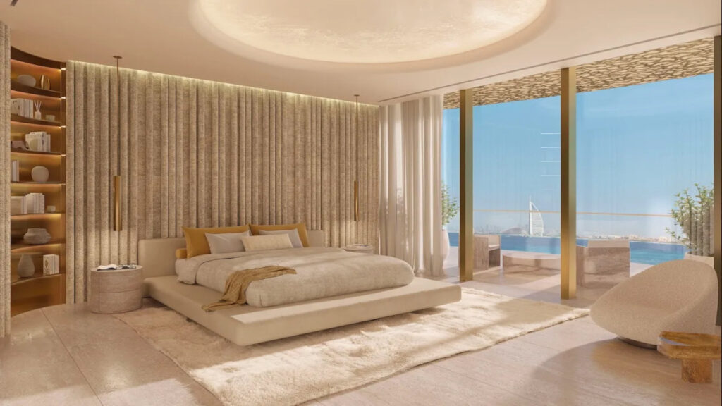 Bedroom view from different angle showing Burj Al Arab through the windows with open curtains - Maison Margiela Residences, Palm Jumeirah